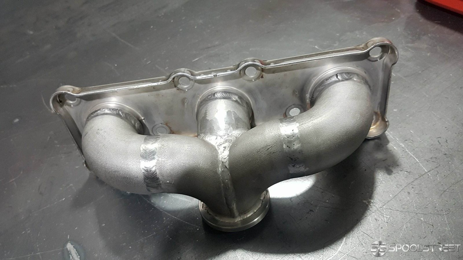 Custom clearance turbo manifolds